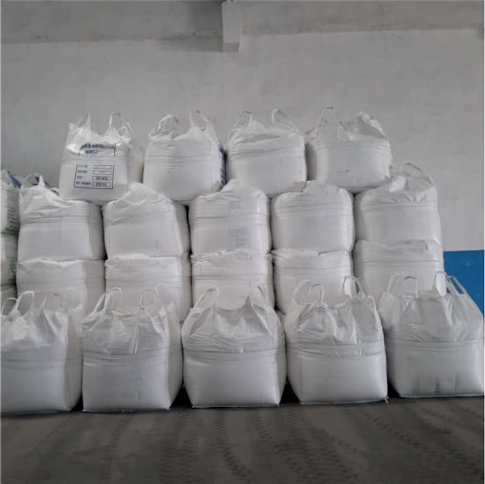 Jumbo bags of bulk cargo stacked in a warehouse