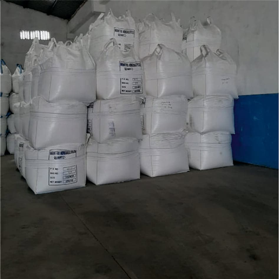 Rows of marked jumbo bags inside the warehouse