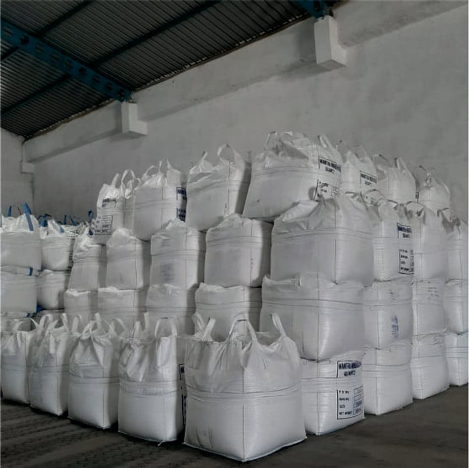 Warehouse shed filled with stacked jumbo bags