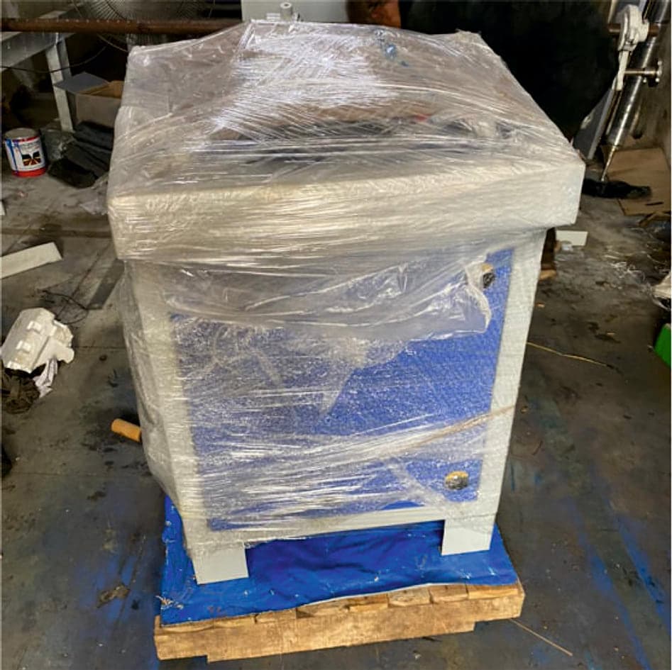 Machinery shrink-wrapped on a pallet