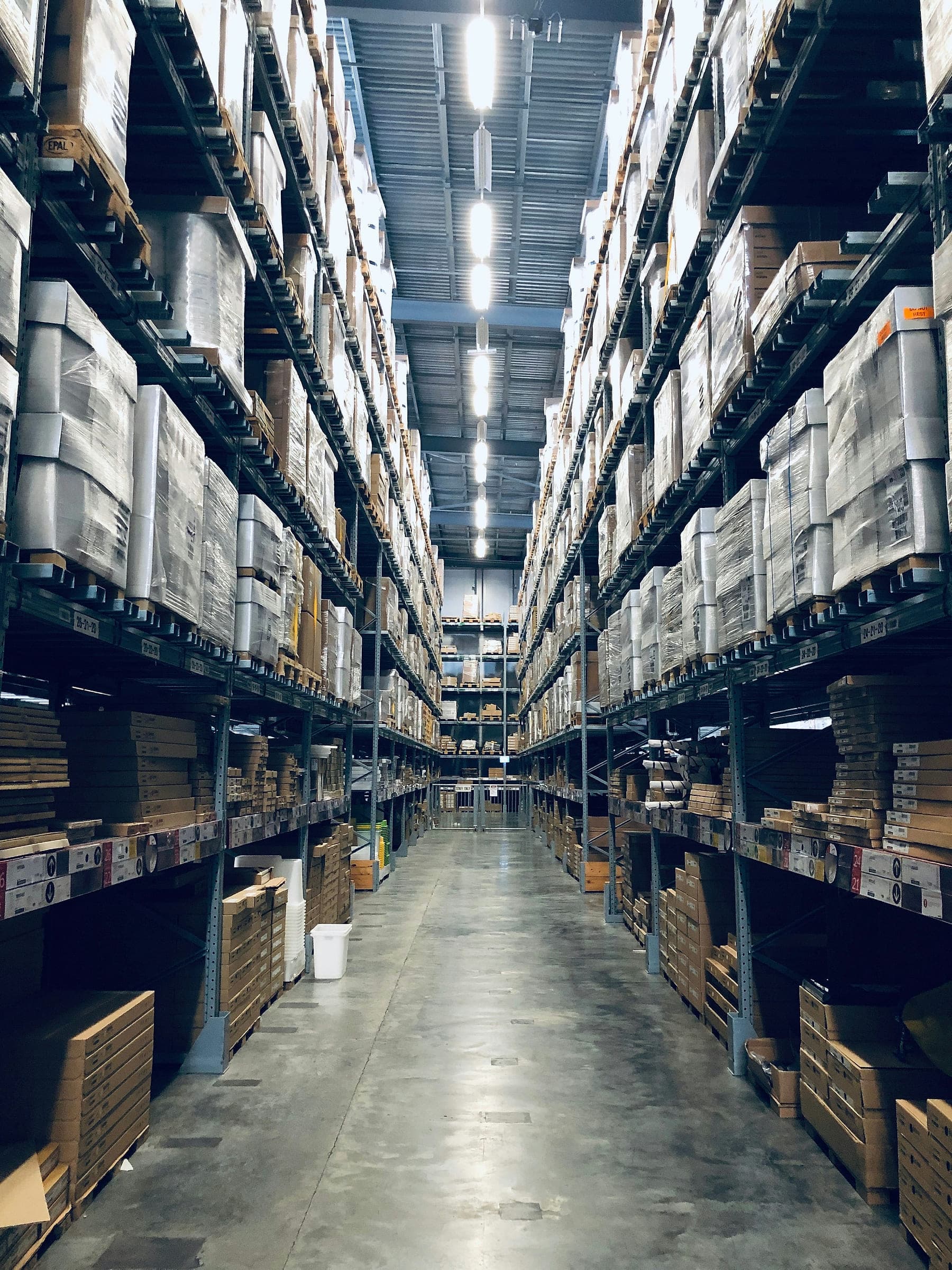 Racked warehouse aisle stacked to height